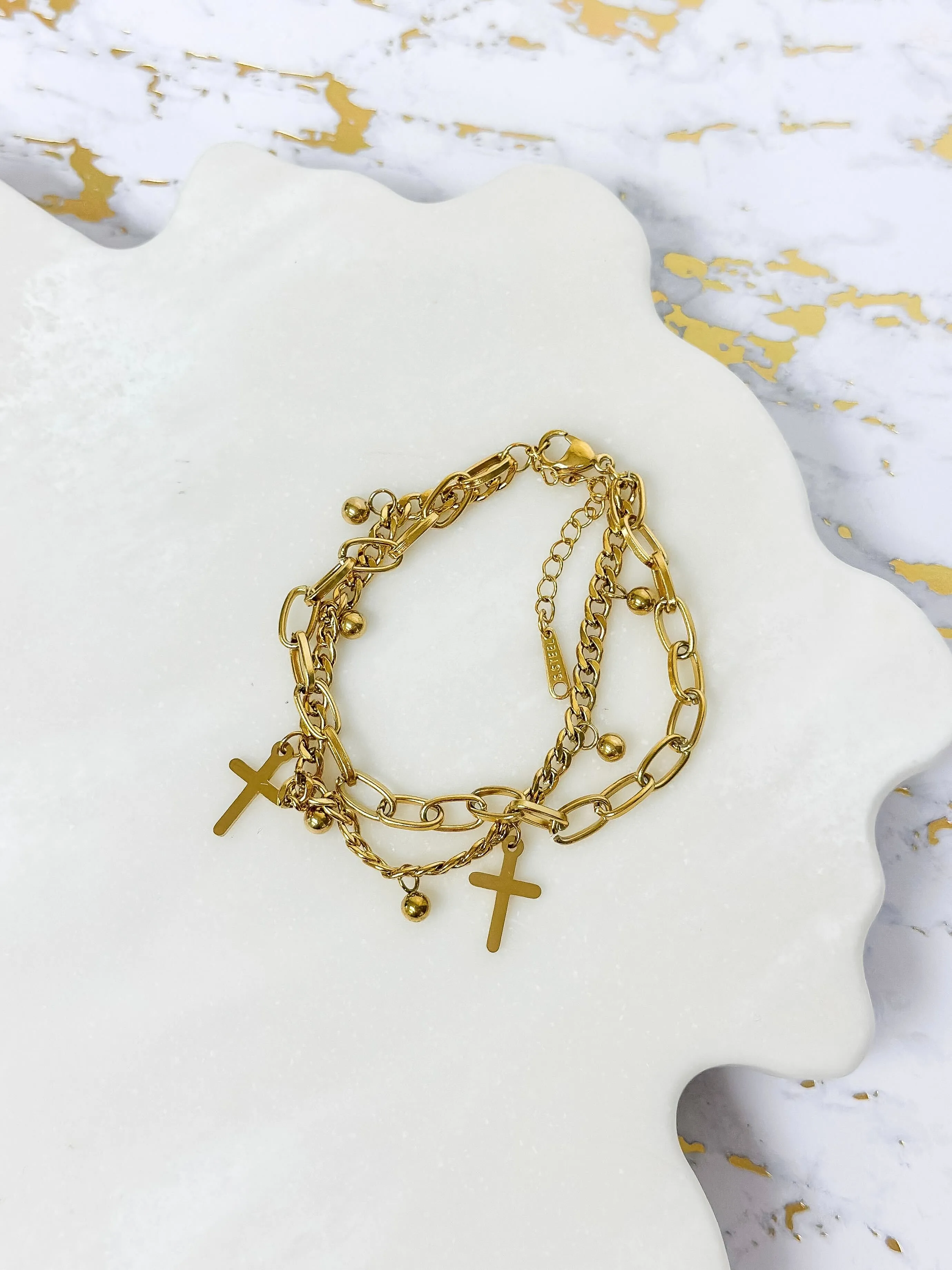 Cross Charm Bracelet by Lauren Kenzie