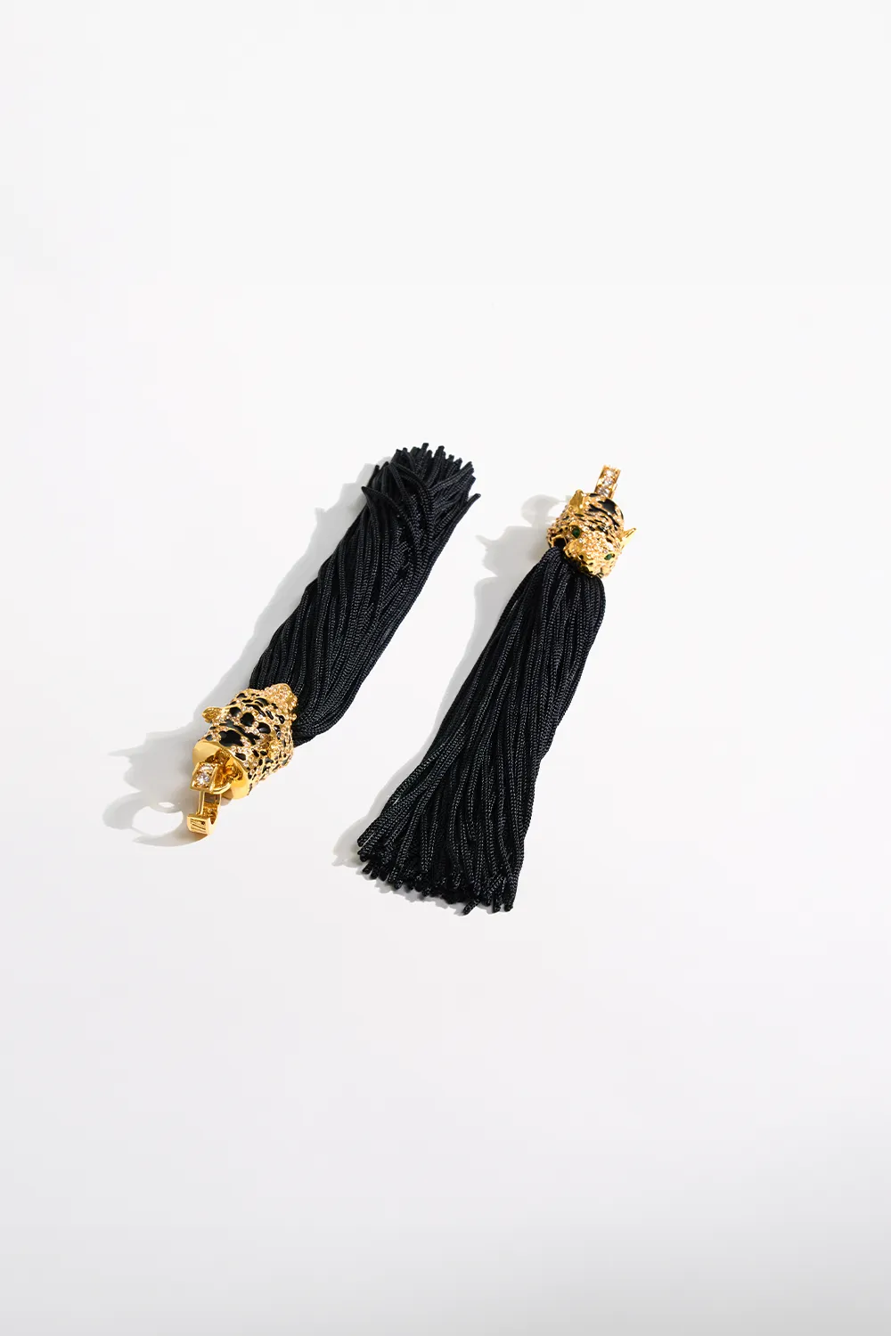 FIERCE FOLKLORE BLACK TASSEL EARRINGS GOLD